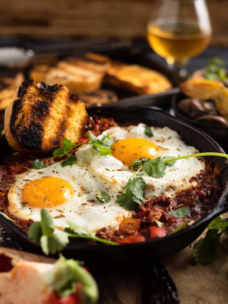 mexican baked eggs in a castiron pan