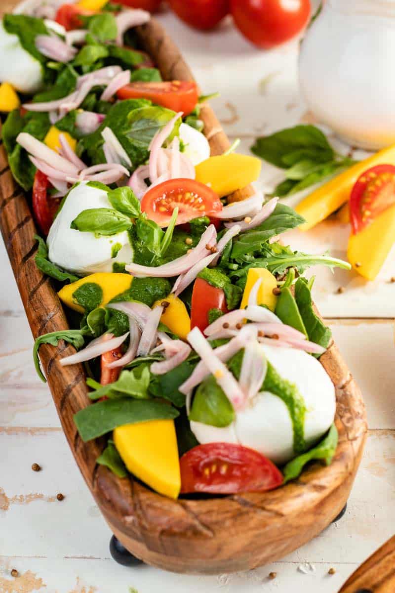 burrata salad on platter