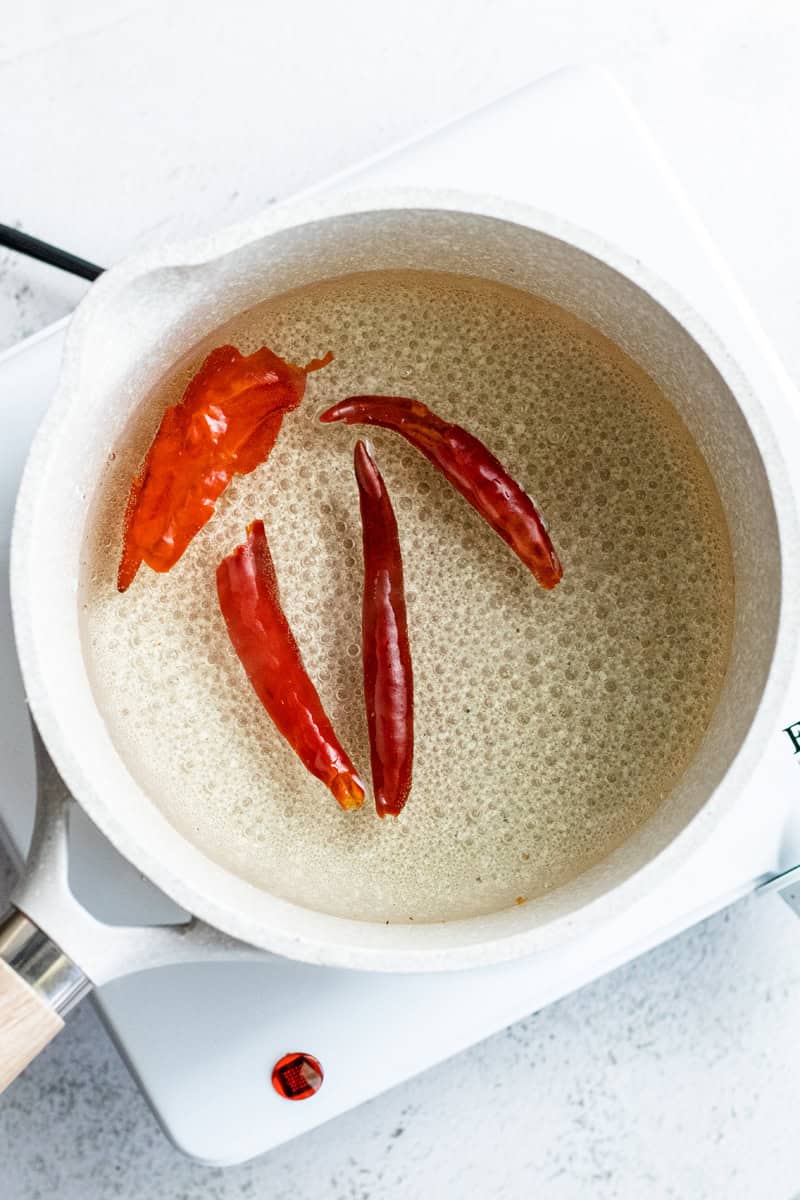 chipotle chiles soaking in water