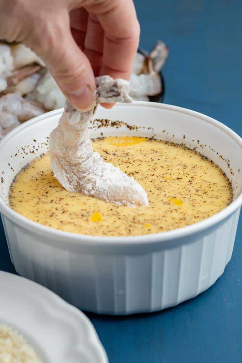 dipping shrimp in egg wash
