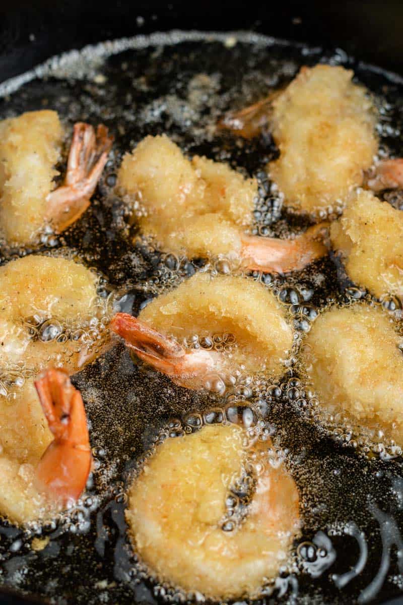 fried shrimp in oil in pan