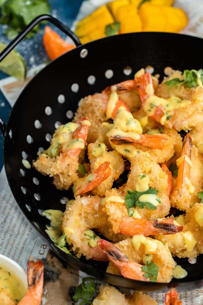 fried shrimp drizzled with mango habanero sauce