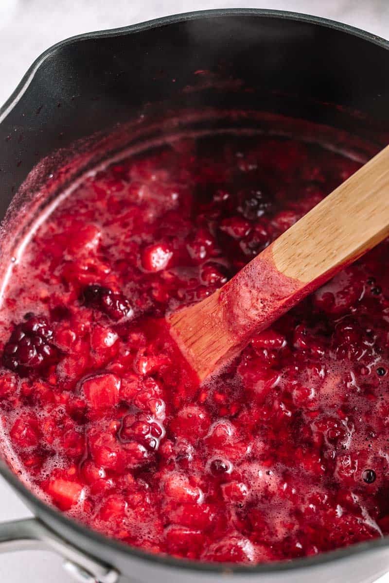 mixed berry compote in a saucepan
