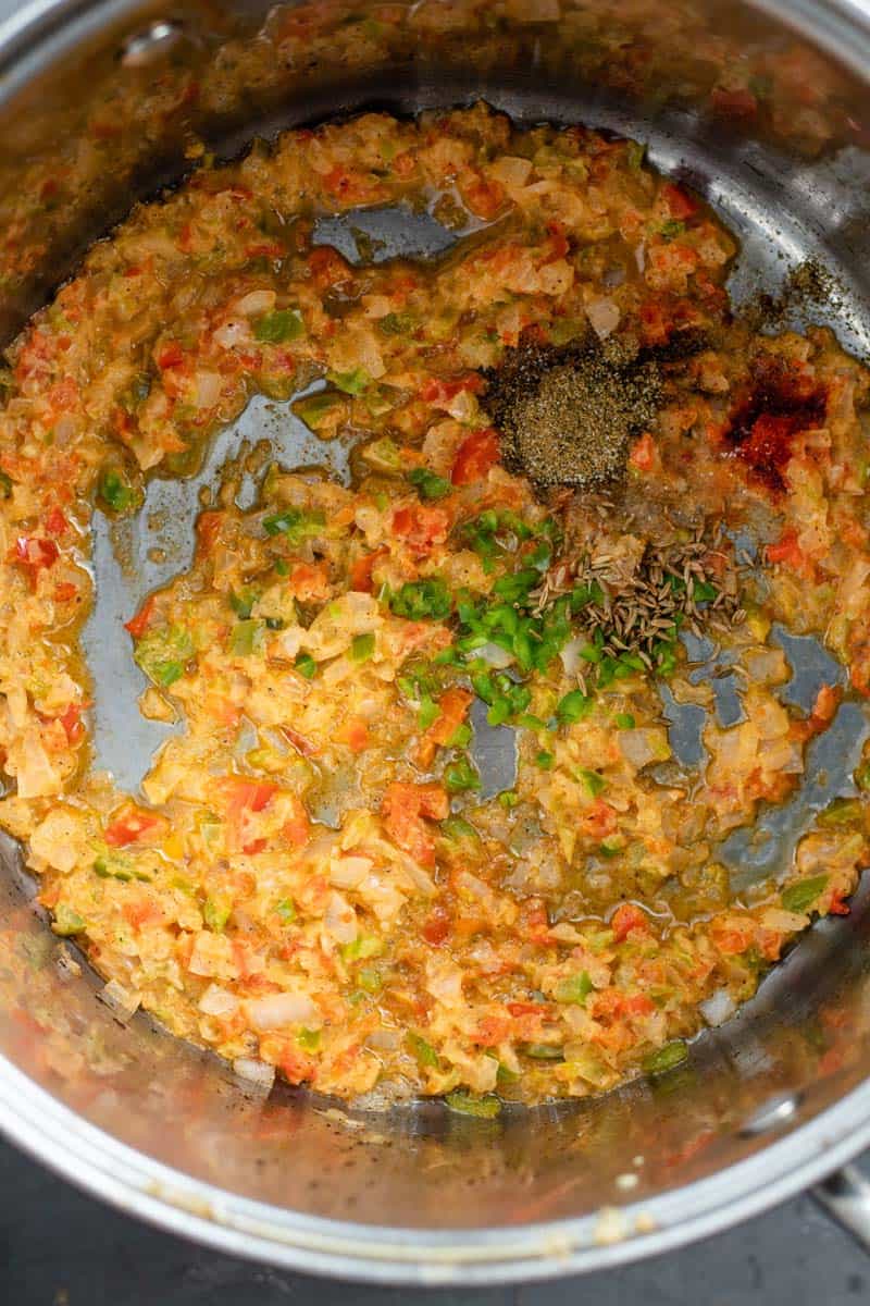 onions, pepper, garlic and ginger in pot