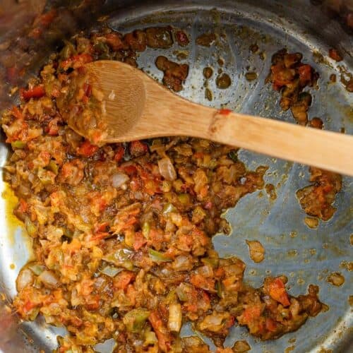 onions, pepper, garlic and ginger in pot