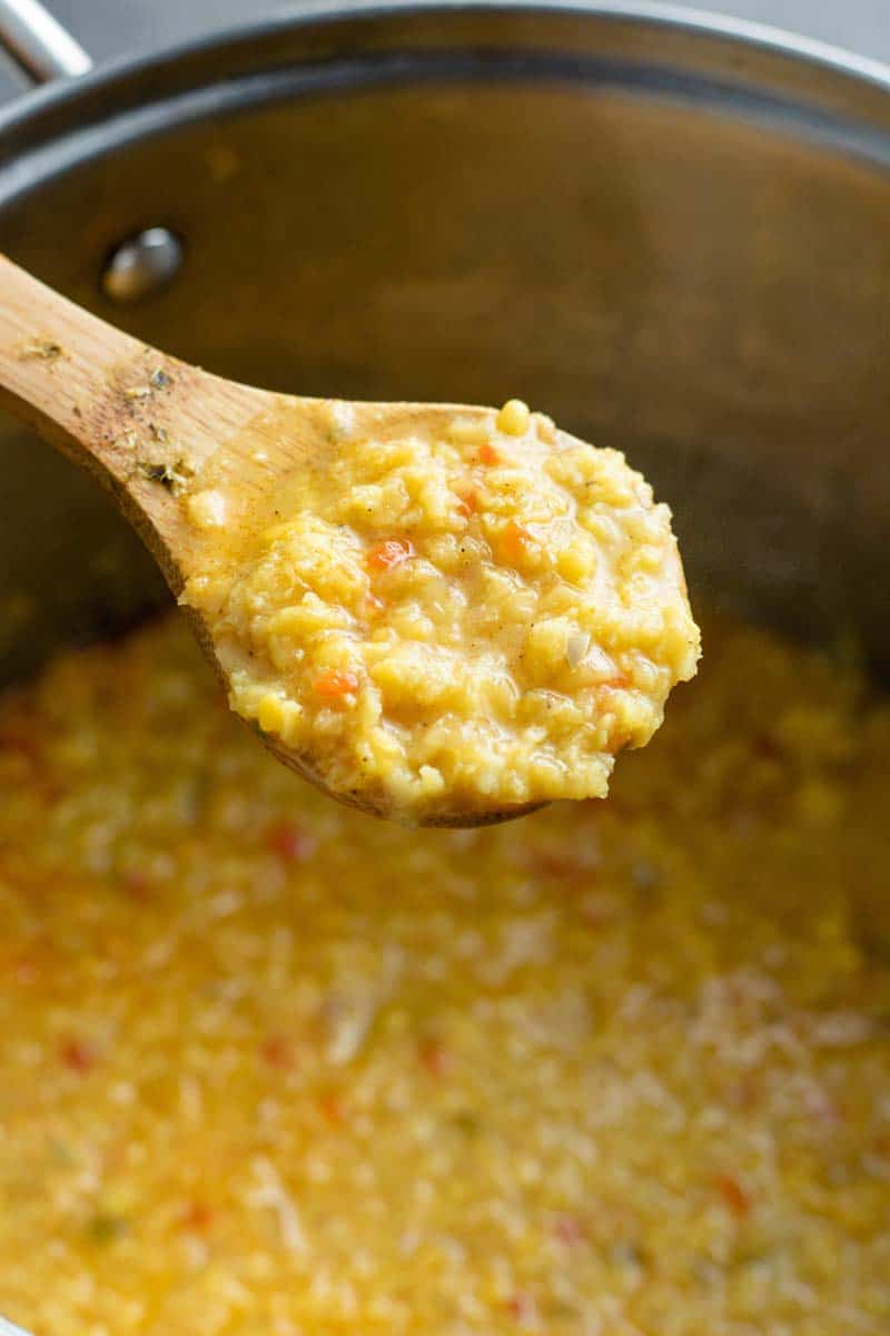 moong dal on a wooden spoon