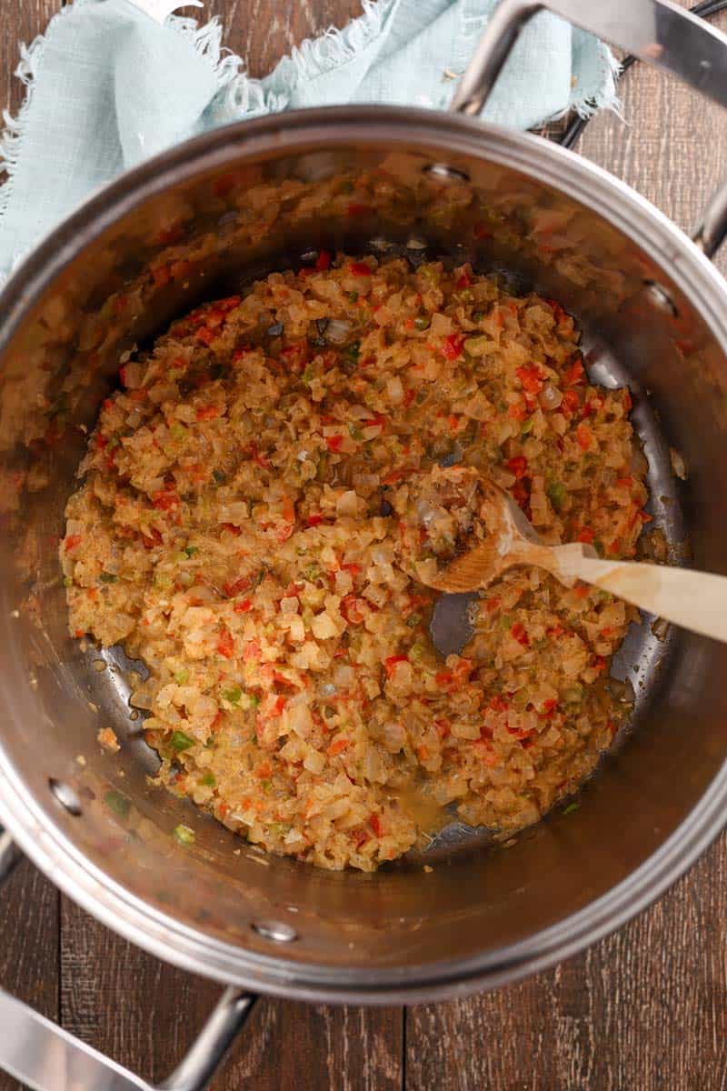 tadka in a stainless steel pot