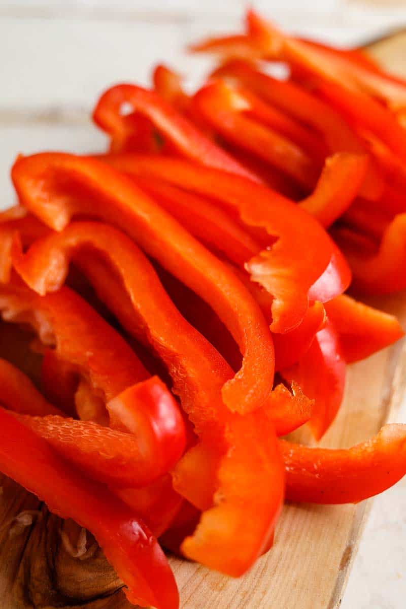 red peppers on a cutting board