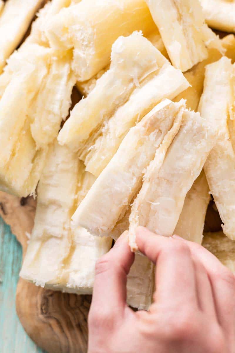removing the inner root from the boiled yuca