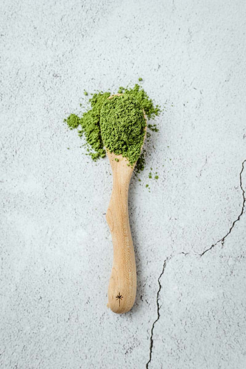 matcha powder on a spoon