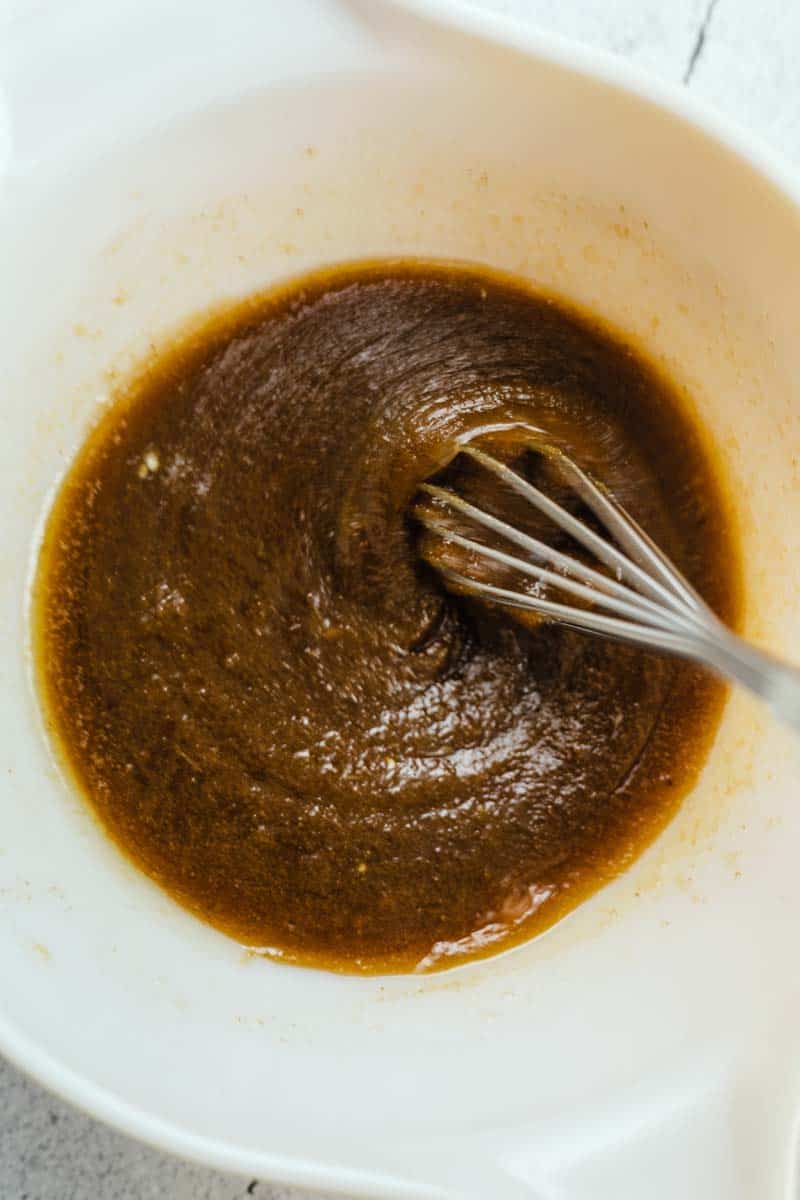 wet ingredients for matcha cookies in a bowl