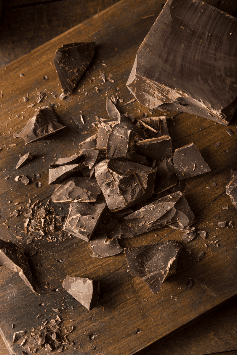 Semisweet baker's chocolate on a wooden surface.