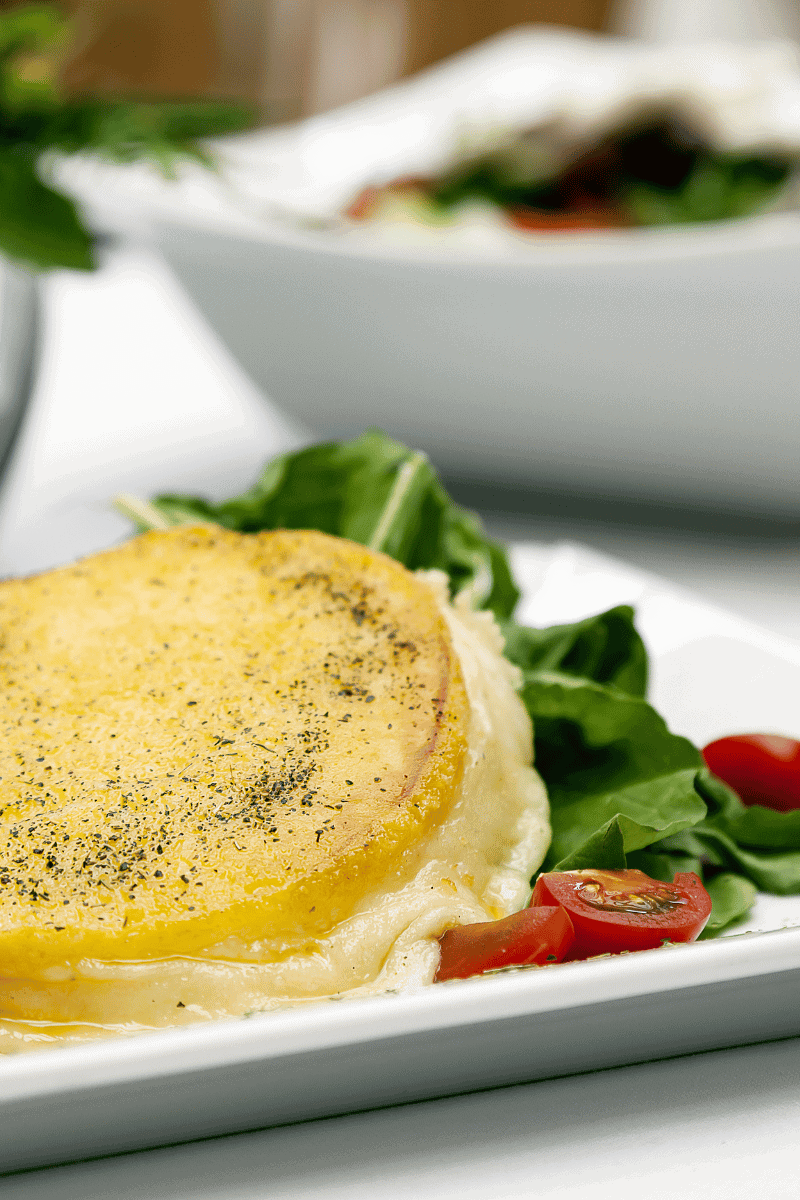 Fried Greek cheese on a plate.