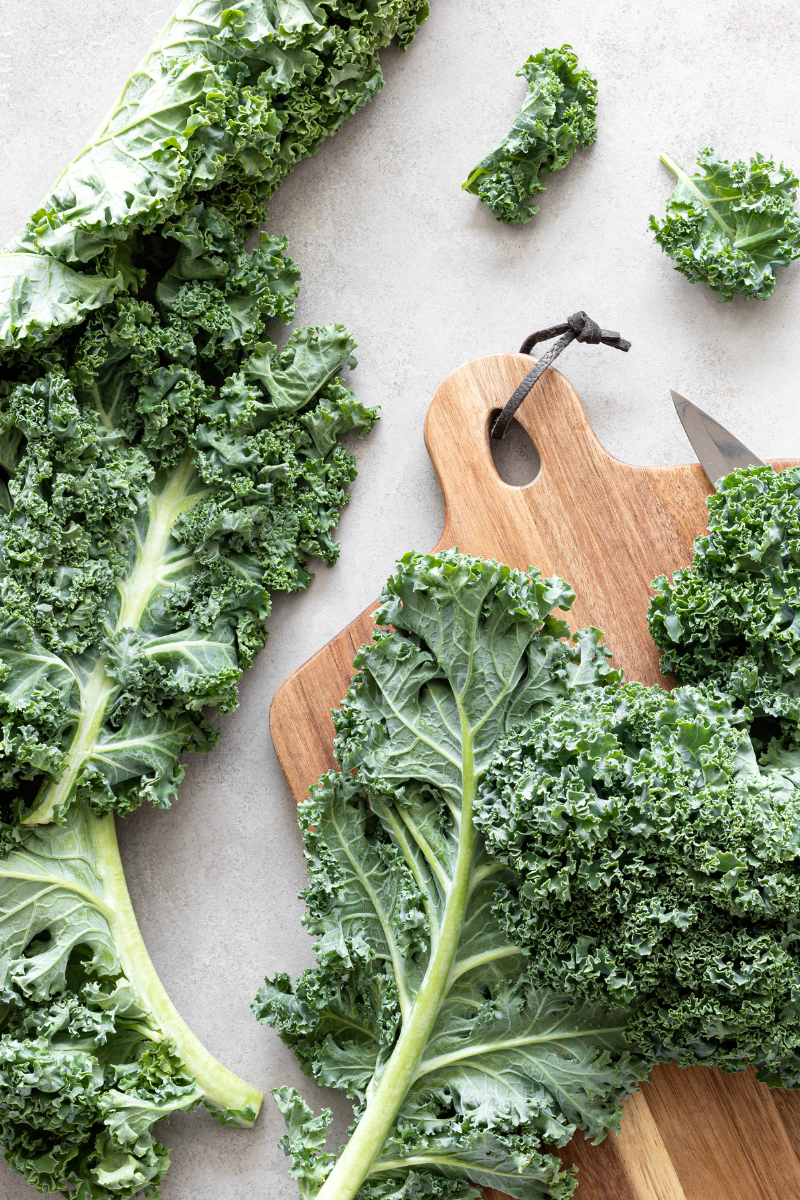 kale on a cutting board.