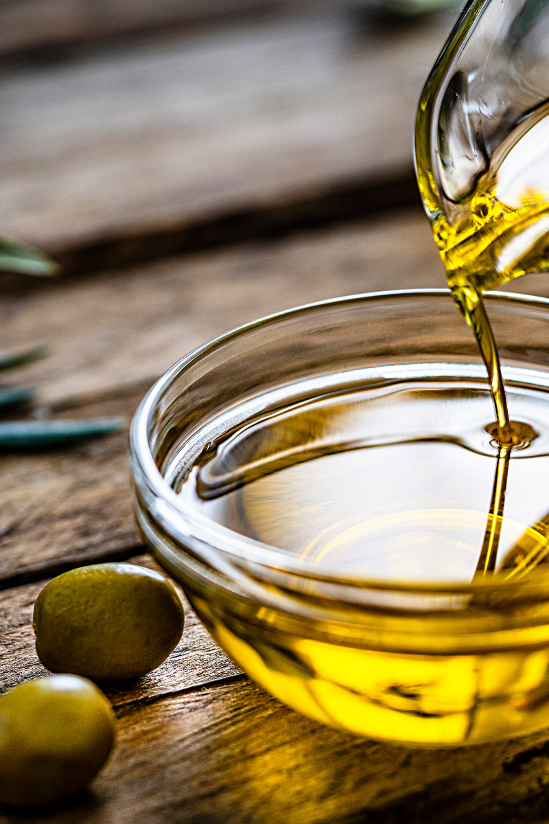 olive oil on a wood surface.